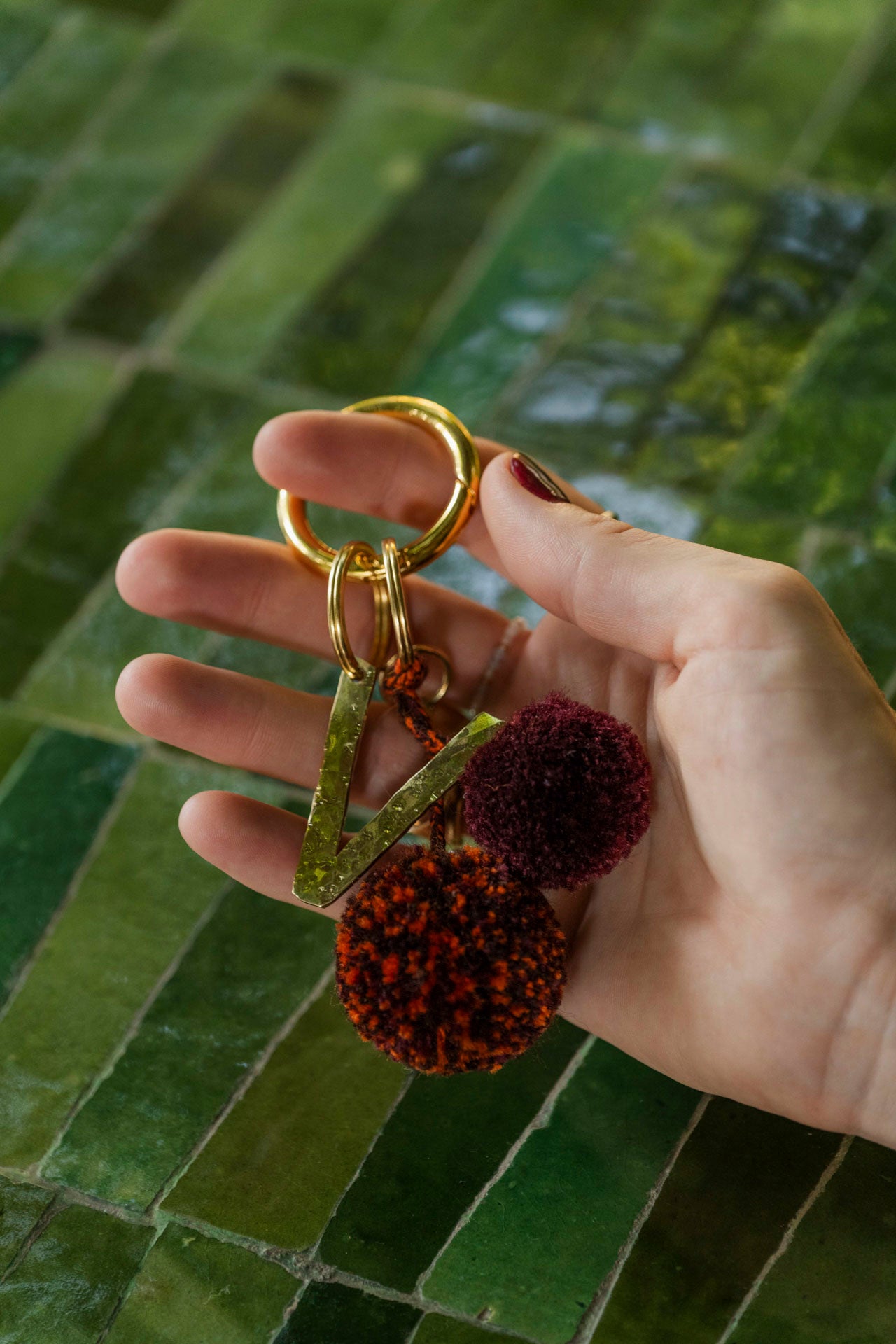 pom pom - KOURA - bordeaux/orange/brown