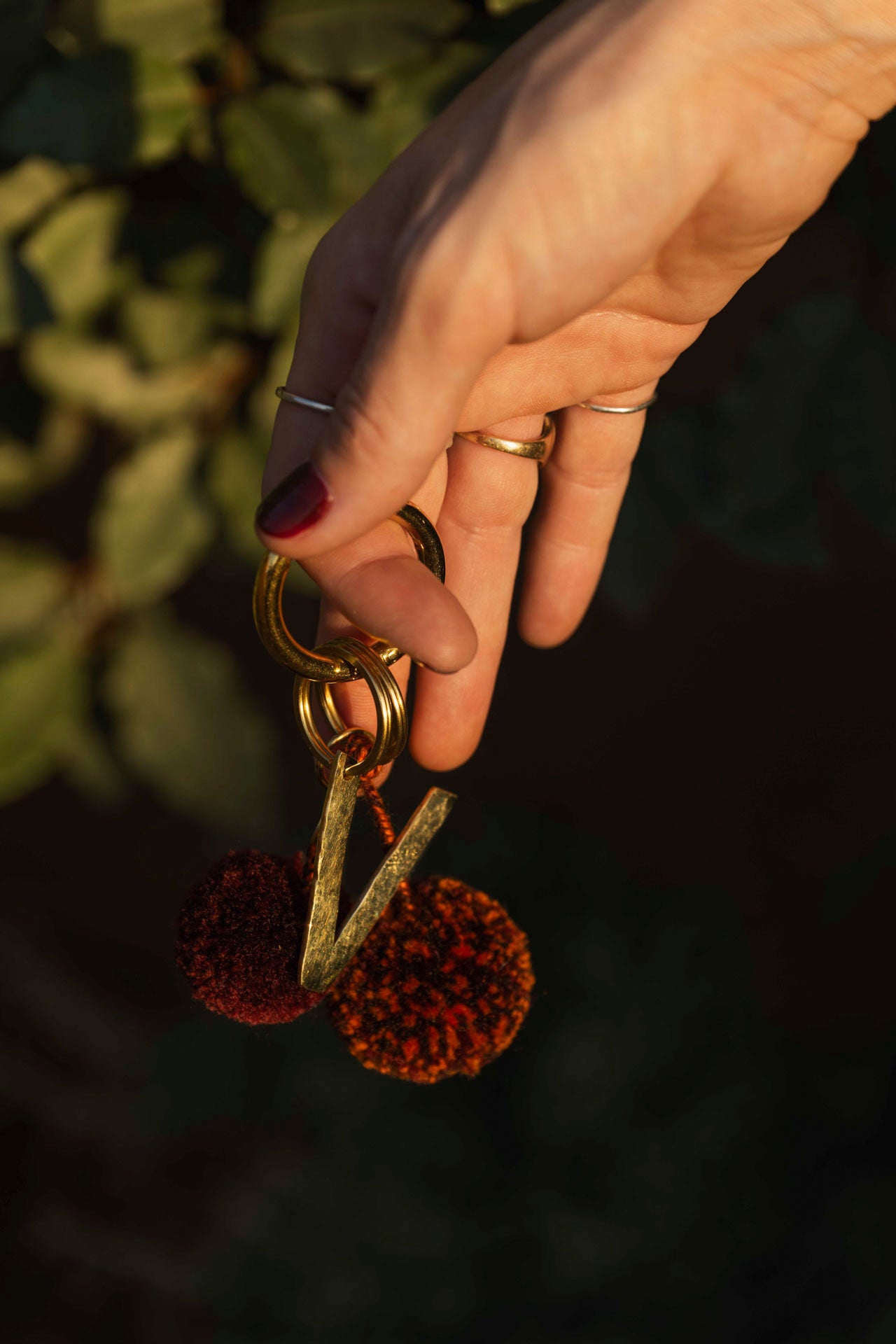 pom pom - KOURA - bordeaux/orange/brown