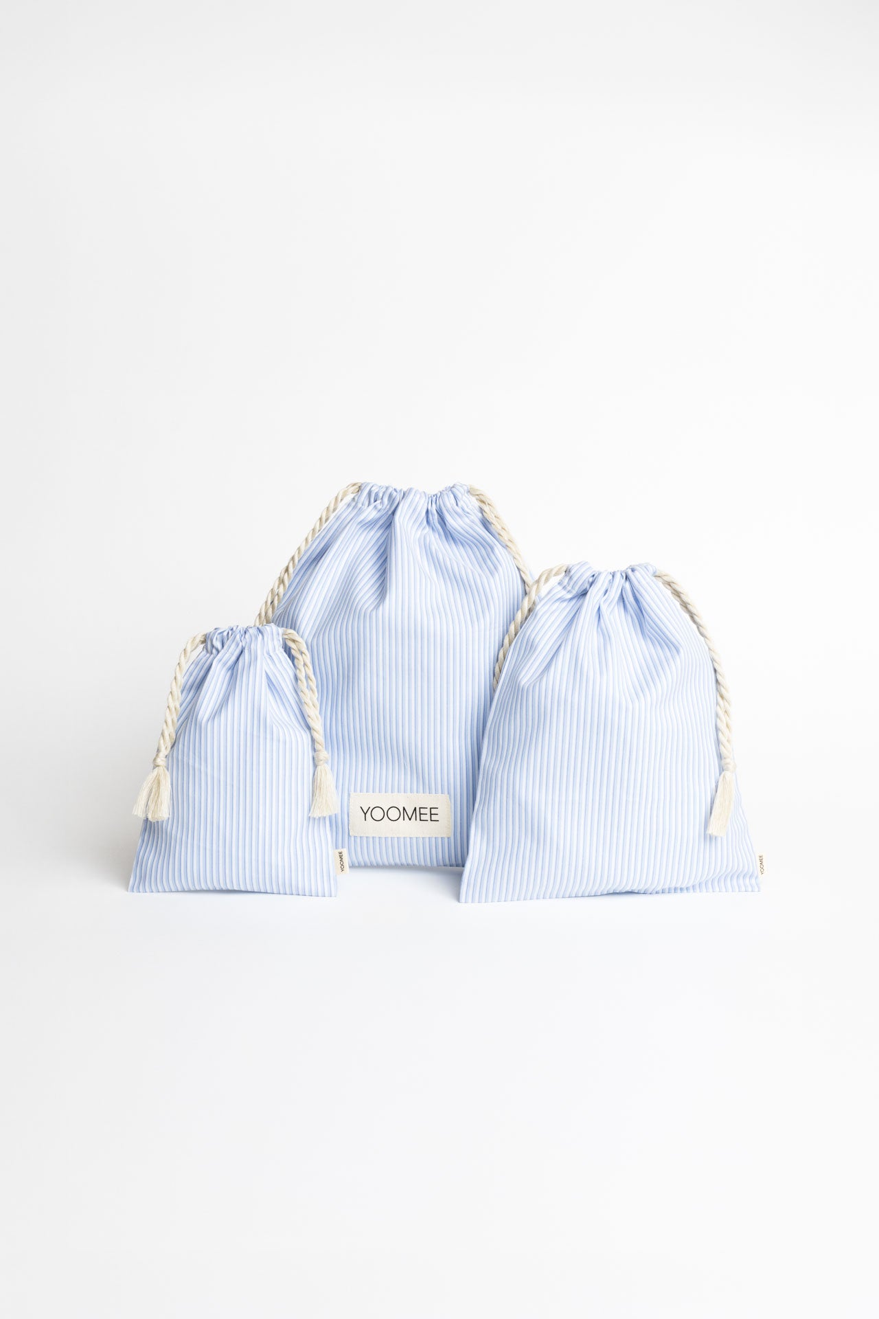 present pouch - FAHRA - lines light blue