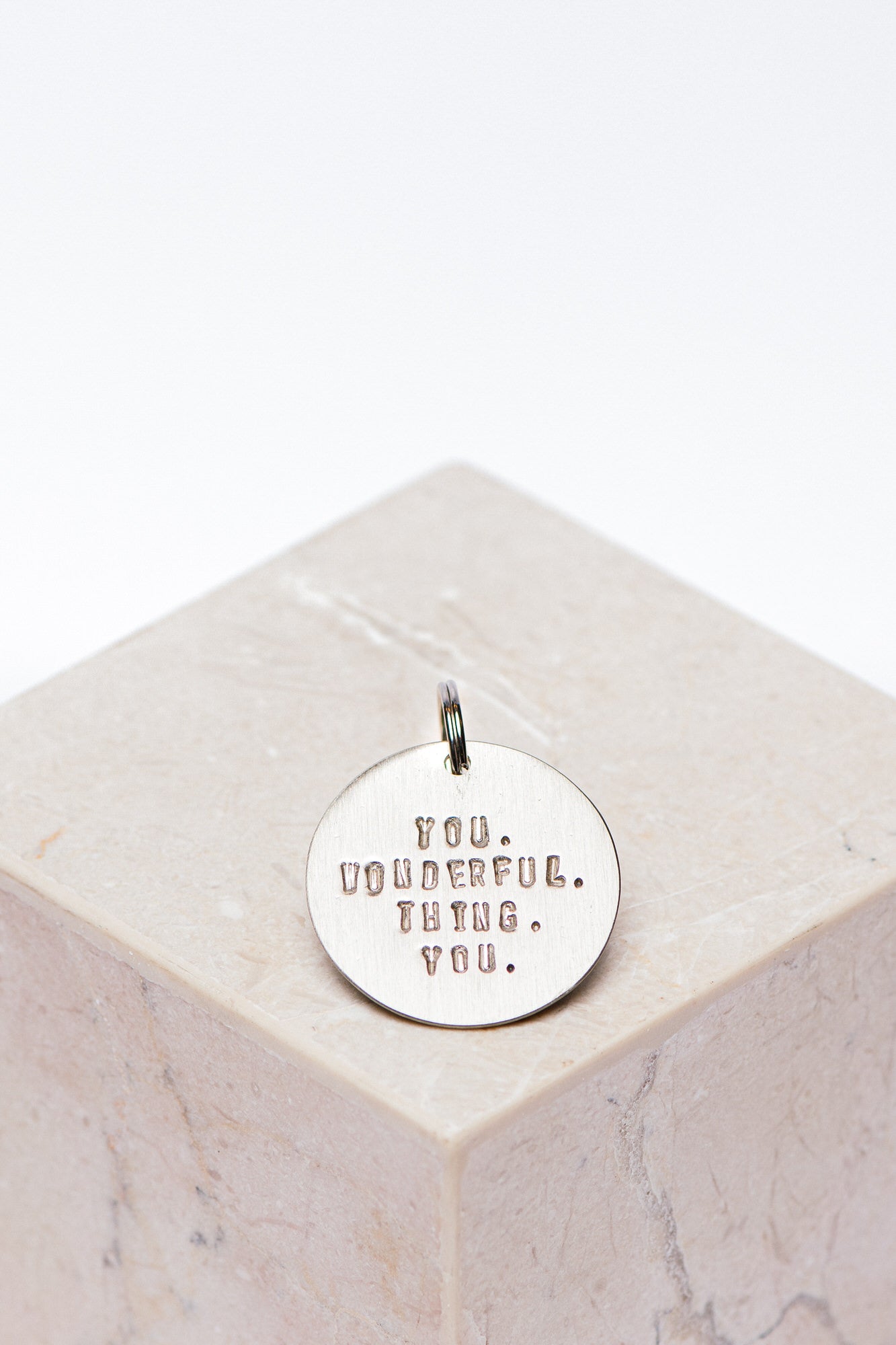 key - tag - you. wonderful. thing. you.