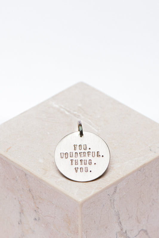 key - tag - you. wonderful. thing. you.